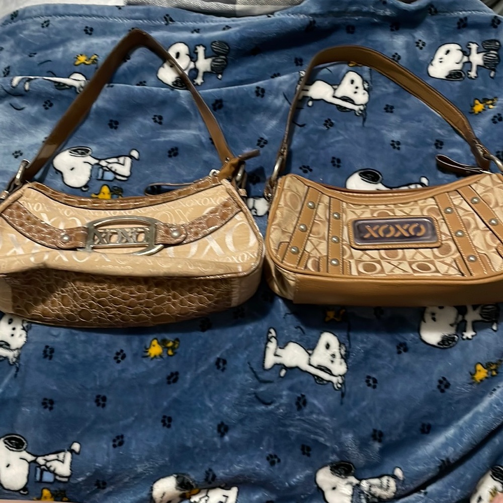 Never used, inside and outside of purses in perfect condition